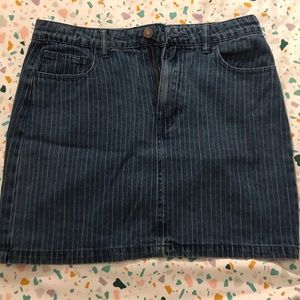 Denim skirt with purple pin stripes